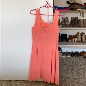 Peach colored dress with scalloped edges
